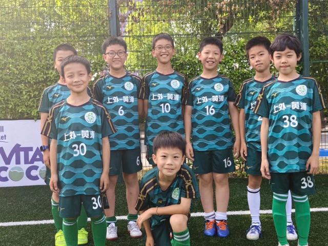 1718951914568066429.jpg 上外-黄浦校队合照.jpg